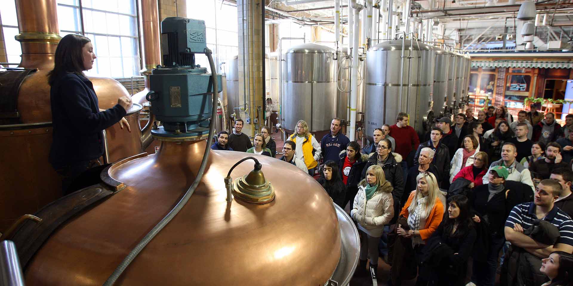 People brewing beer